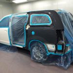 van prepped in paint booth